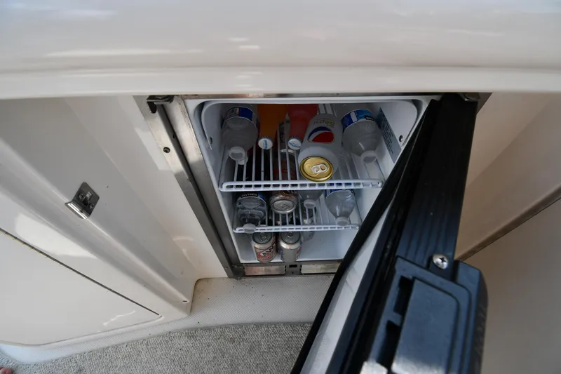 Slide: The Image of Mini fridge stocked with drinks on a 2004 Sea Ray 360 Sundancer yacht. - 27