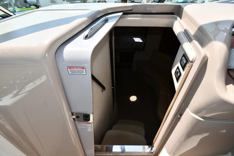Slide: The Image of 2004 Sea Ray 360 Sundancer cabin entrance with steps and control panel. - 30