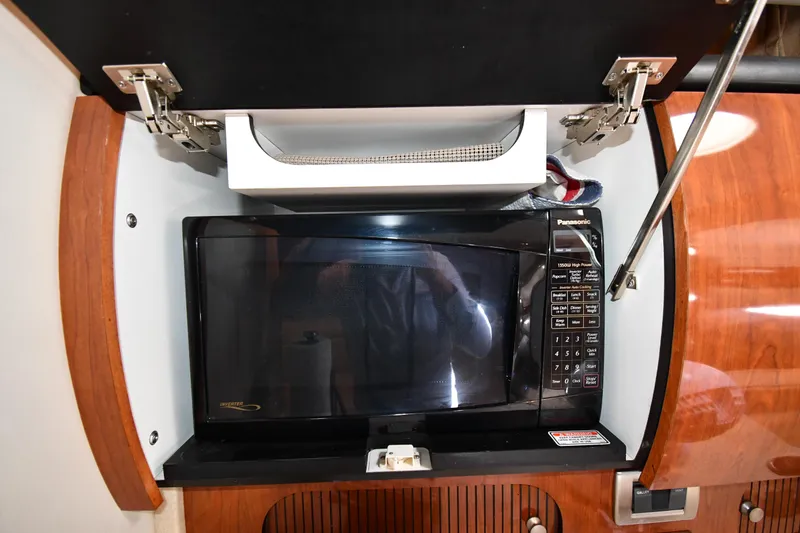Slide: The Image of Microwave in 2004 Sea Ray 360 Sundancer yacht kitchen cabinet. - 48