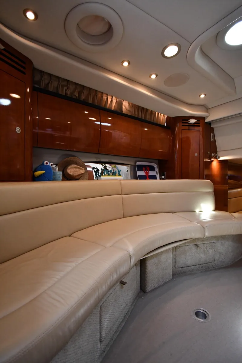 Slide: The Image of Luxurious interior of a 2004 Sea Ray 360 Sundancer yacht with plush seating. - 45