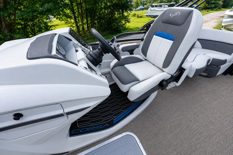 Slide: The Image of 2023 Barletta Corsa 21Q boat interior with modern helm and comfortable seating. - 10