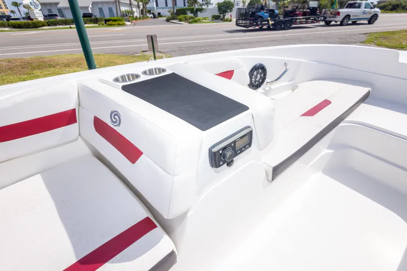 Slide: The Image of 2021 Hurricane SunDeck Sport 185 OB boat interior with seating, cup holders, and control panel. - 25
