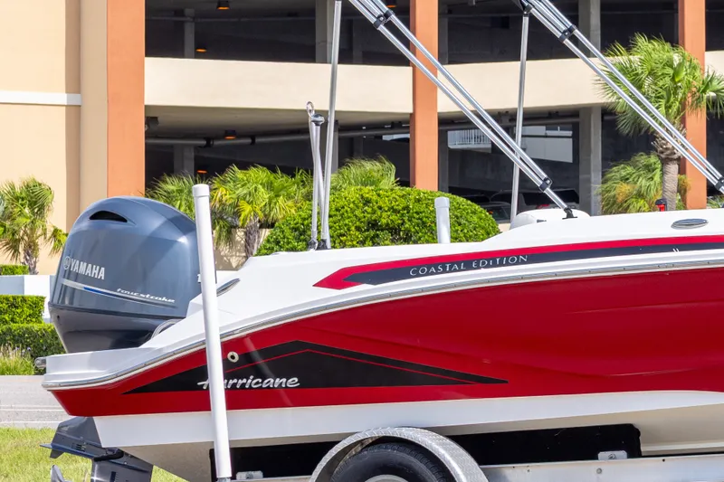 Slide: The Image of 2021 Hurricane SunDeck Sport 185 OB boat with Yamaha engine, red and white design. - 15