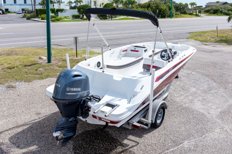 Slide: The Image of 2021 Hurricane SunDeck Sport 185 OB boat with Yamaha 115 engine on trailer. - 42