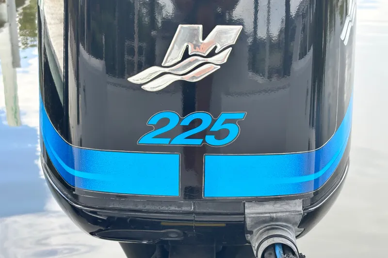 Slide: The Image of Outboard motor with blue "225" decal on a 2002 Ranger 2300 Bay Ranger boat. - 20