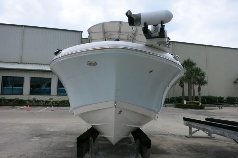 Slide: The Image of 2019 Robalo R200 Center Console boat on display at a marina. - 3