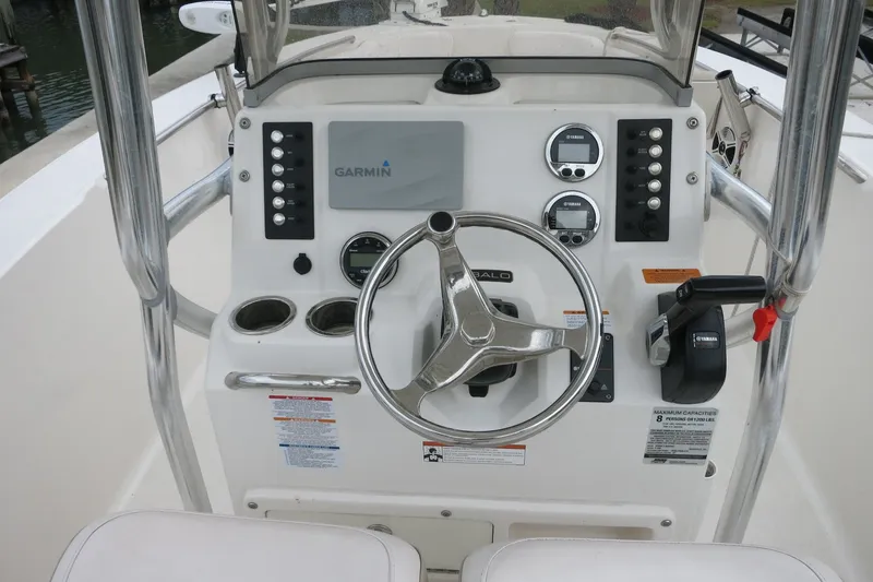 Slide: The Image of 2019 Robalo R200 Center Console boat dashboard with Garmin navigation system. - 19