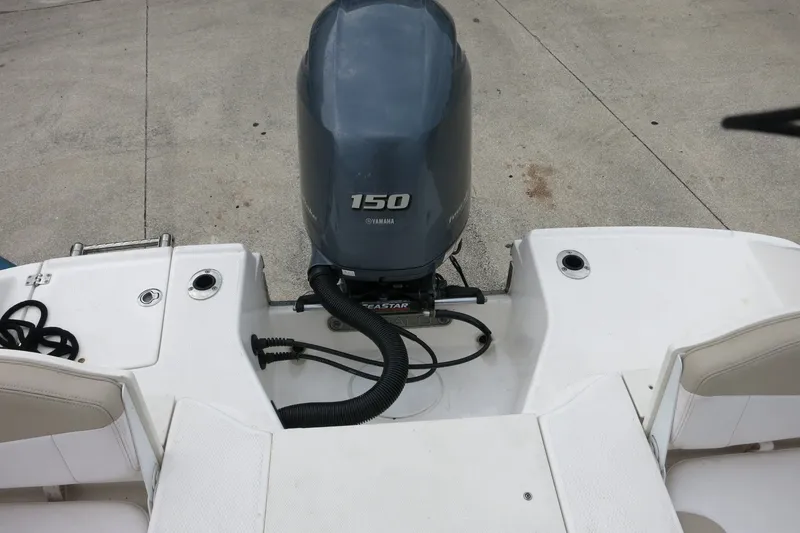Slide: The Image of 2019 Robalo R200 Center Console boat with Yamaha 150 engine, rear view. - 21