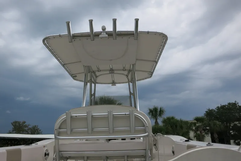 Slide: The Image of 2019 Robalo R200 Center Console boat with T-top under cloudy sky. - 22