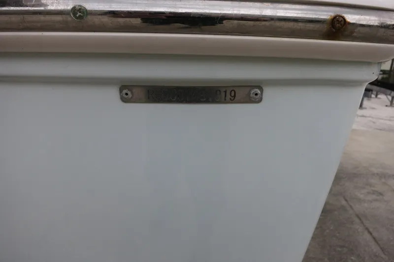 Slide: The Image of 2019 Robalo R200 Center Console boat with visible identification plate. - 10