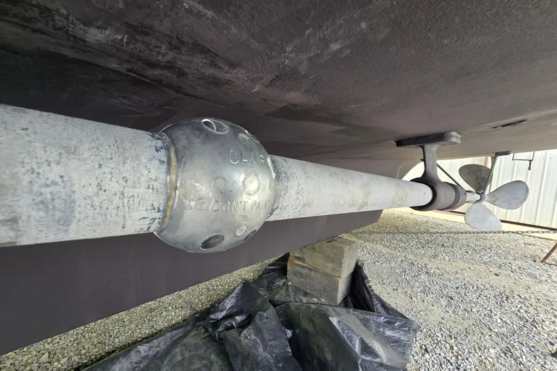 Slide: The Image of Propeller shaft and anode of a 1980 Hatteras 70 Motor Yacht, under maintenance. - 36
