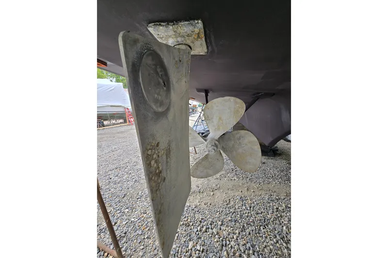 Slide: The Image of Underwater view of 1980 Hatteras 70 Motor Yacht propeller and rudder. - 41