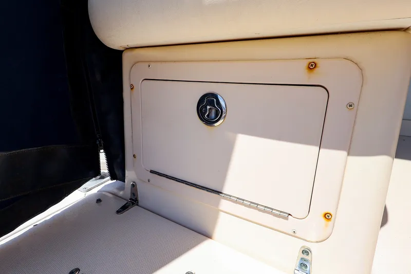 Slide: The Image of Storage compartment on a 2015 Grady-White Sailfish 282 boat interior. - 19