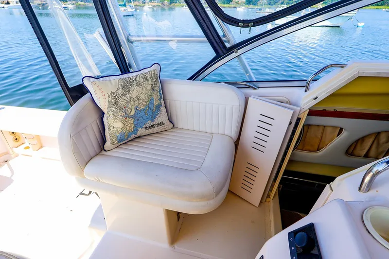 Slide: The Image of Grady-White Sailfish 282 boat interior with map-themed cushion, 2015 model. - 28