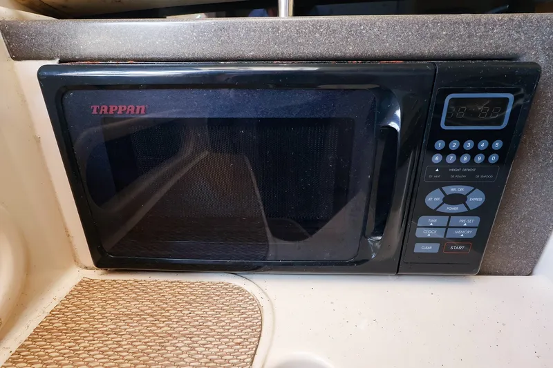 Slide: The Image of Tappan microwave in 2015 Grady-White Sailfish 282 boat kitchen area. - 32