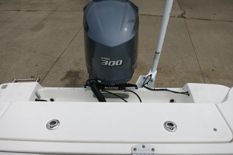 Slide: The Image of 2020 Robalo R247 Dual Console with Yamaha 300 outboard motor, rear view. - 7
