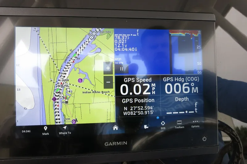 Slide: The Image of Garmin GPS display on 2020 Robalo R247 Dual Console, showing navigation and speed data. - 32