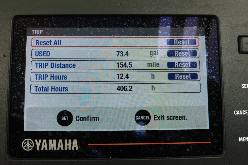 Slide: The Image of Yamaha display showing trip data: 73.4 gallons used, 154.5 miles traveled, 12.4 trip hours. - 30