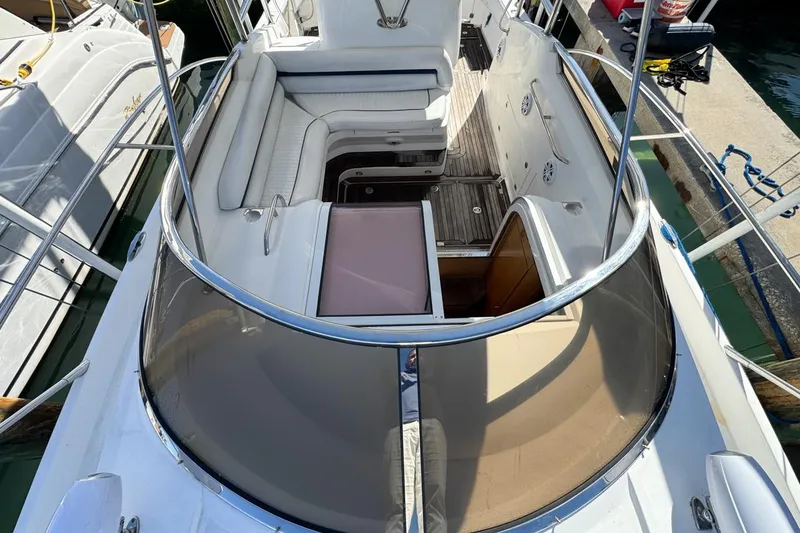 Slide: The Image of 2004 Sunseeker Sportfisher 37 boat interior with seating and deck view. - 63
