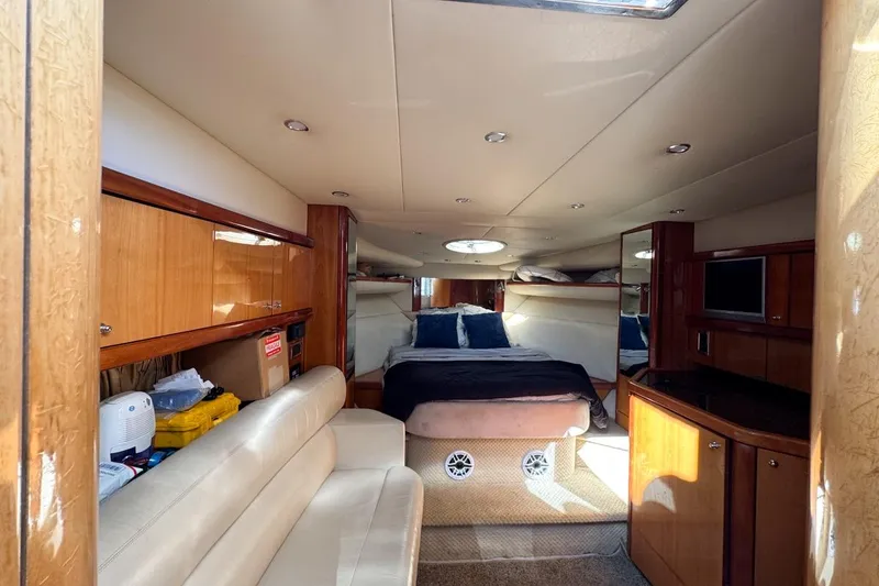 Slide: The Image of Luxurious interior of 2004 Sunseeker Sportfisher 37 yacht with cozy seating and elegant wood finishes. - 87