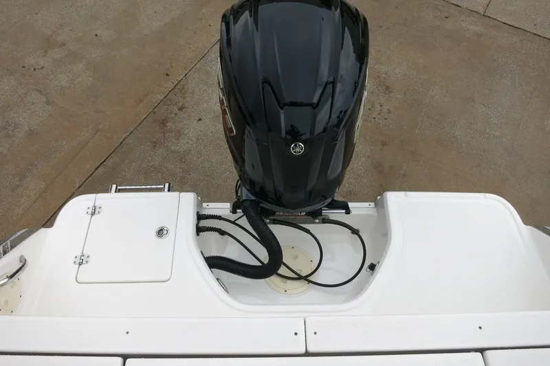 Slide: The Image of 2022 Robalo R230 Center Console boat with Yamaha outboard motor, viewed from above. - 9