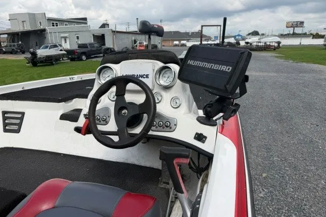 Slide: The Image of 2008 Nitro Z-7 boat dashboard with steering wheel and Humminbird fish finder. - 7
