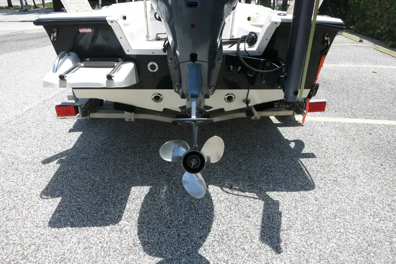 Slide: The Image of Rear view of a 2016 Key West 1720 Center Console boat with visible propeller. - 6