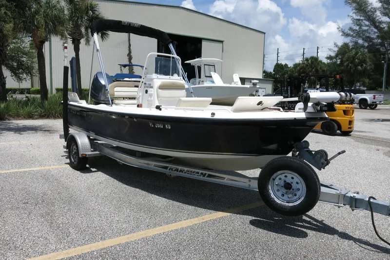 Slide: The Image of 2016 Key West 1720 Center Console boat on trailer in parking lot. - 10