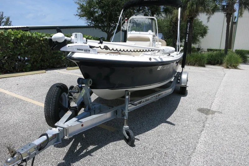 Slide: The Image of 2016 Key West 1720 Center Console boat on trailer in parking lot. - 3