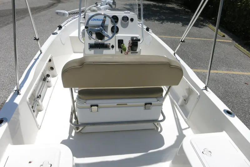 Slide: The Image of 2016 Key West 1720 Center Console boat interior with steering wheel and seating. - 22
