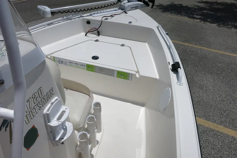 Slide: The Image of 2016 Key West 1720 Center Console boat interior with seating and storage compartments. - 26