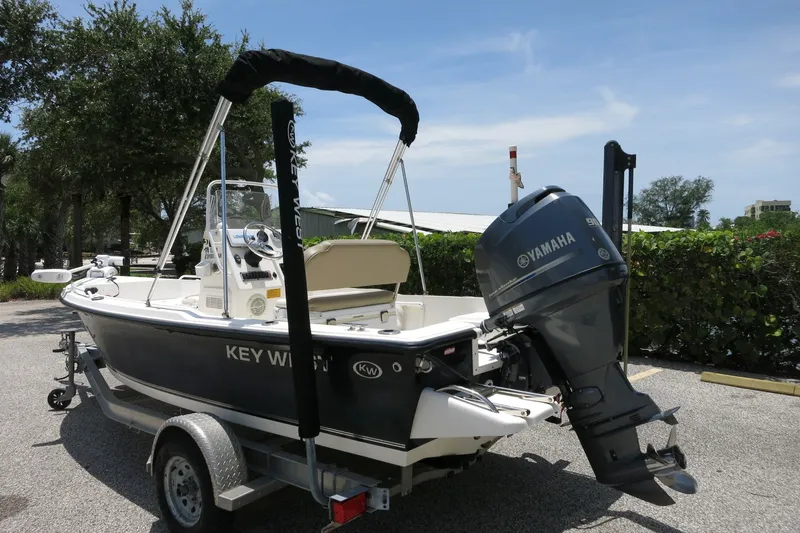 Slide: The Image of 2016 Key West 1720 Center Console boat with Yamaha engine on trailer. - 16