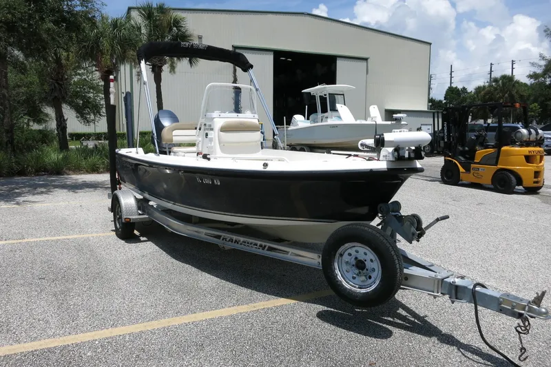 Slide: The Image of 2016 Key West 1720 Center Console boat on trailer in parking lot. - 11