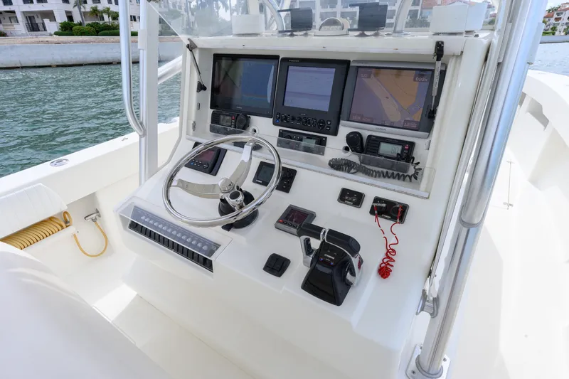 Slide: The Image of 2011 SeaVee 340B Open boat console with advanced navigation and control systems. - 8