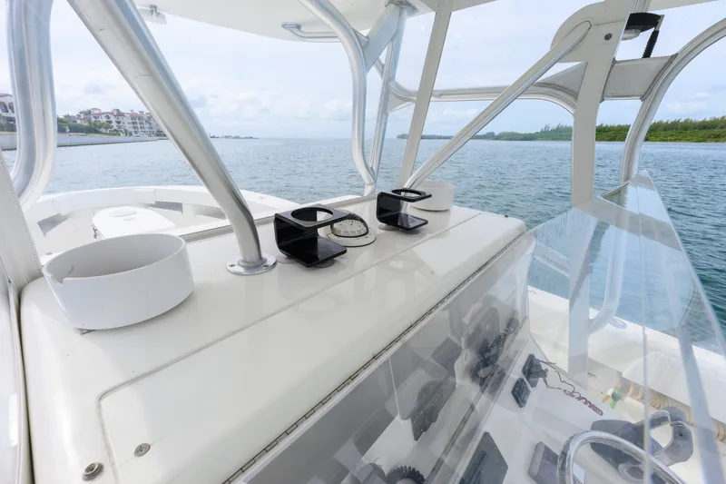 Slide: The Image of 2011 SeaVee 340B Open boat dashboard with ocean view and clear skies. - 10