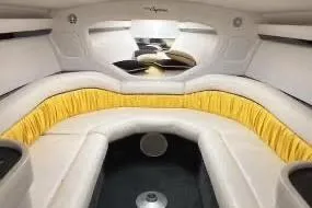 Slide: The Image of Interior of a 2002 Donzi 38 Daytona boat with white and yellow seating. - 13