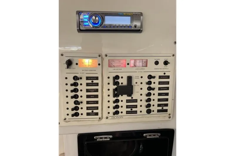 Slide: The Image of Control panel of a 2002 Donzi 38 Daytona boat with stereo system. - 18