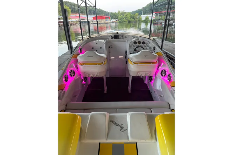Slide: The Image of 2002 Donzi 38 Daytona boat interior with pink LED lights and dual seats. - 20
