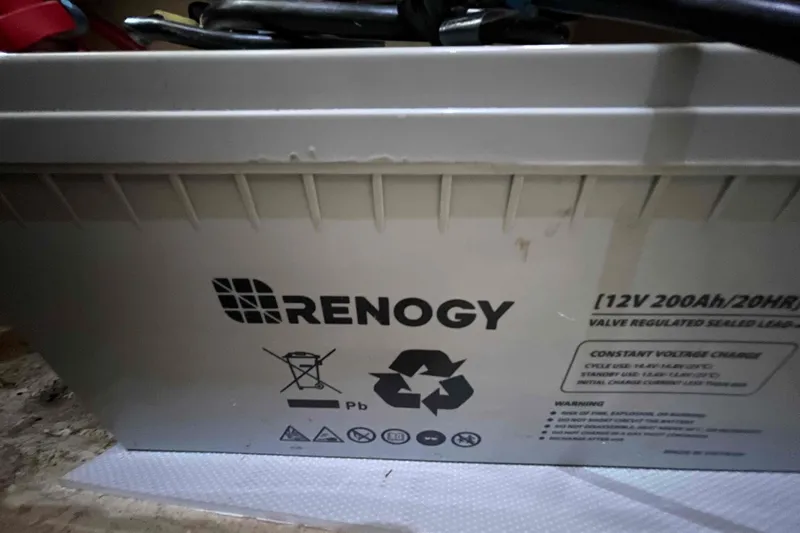 Slide: The Image of Two (2) Renogy 12V 200Ah house batteries on Catalina 320. - 70
