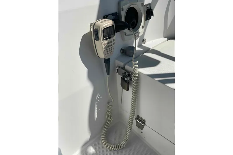 Slide: The Image of VHF radio on 1995 Catalina 320 sailboat, mounted with coiled cord. - 90