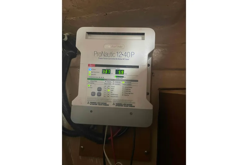 Slide: The Image of ProNautic 12-40P marine battery charger in a Catalina 320 sailboat. - 68