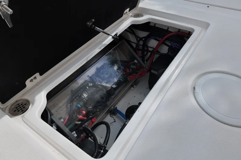 Slide: The Image of 2023 Sea Fox 328 Commander boat compartment with wiring and components visible. - 19