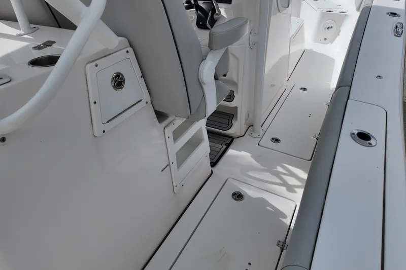 Slide: The Image of 2023 Sea Fox 328 Commander boat interior with seating and storage compartments. - 17