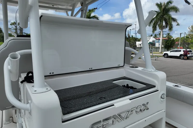 Slide: The Image of 2023 Sea Fox 328 Commander boat interior with storage compartment open. - 20