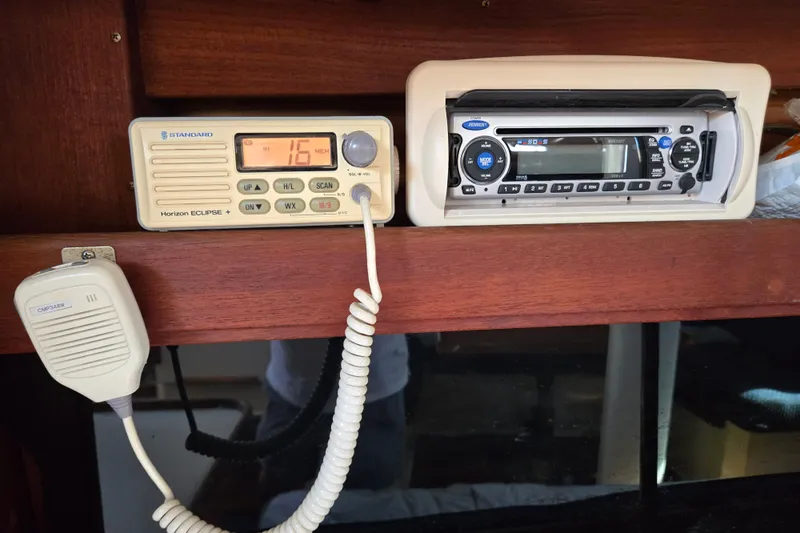 Slide: The Image of VHF radio and stereo system on a 1989 Catalina 34 sailboat. - 17
