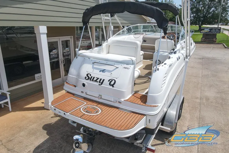 Slide: The Image of 2000 Sea Ray Sundancer 260 boat on trailer, displayed at Georgia Boat Brokers. - 9
