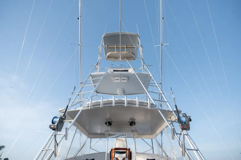 Slide: The Image of Custom Carolina East Bay 2001 yacht with tall tower against clear blue sky. - 32