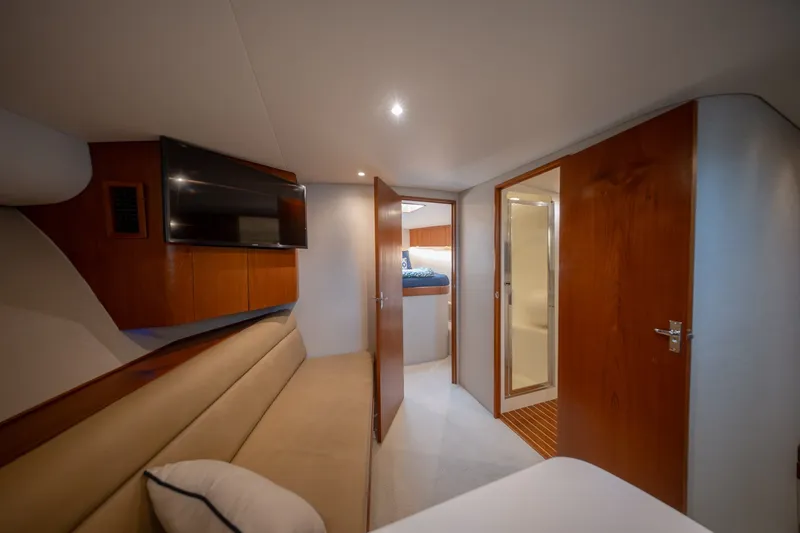 Slide: The Image of Luxurious interior of 2001 Custom Carolina East Bay yacht with cozy seating and modern amenities. - 45