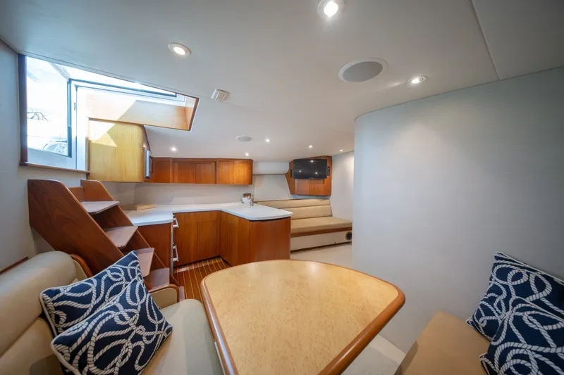 Slide: The Image of Luxurious interior of 2001 Custom Carolina East Bay yacht with modern furnishings and natural light. - 43
