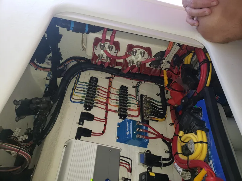 Slide: The Image of Electrical system in a boat with colored wires and fuses. - 14